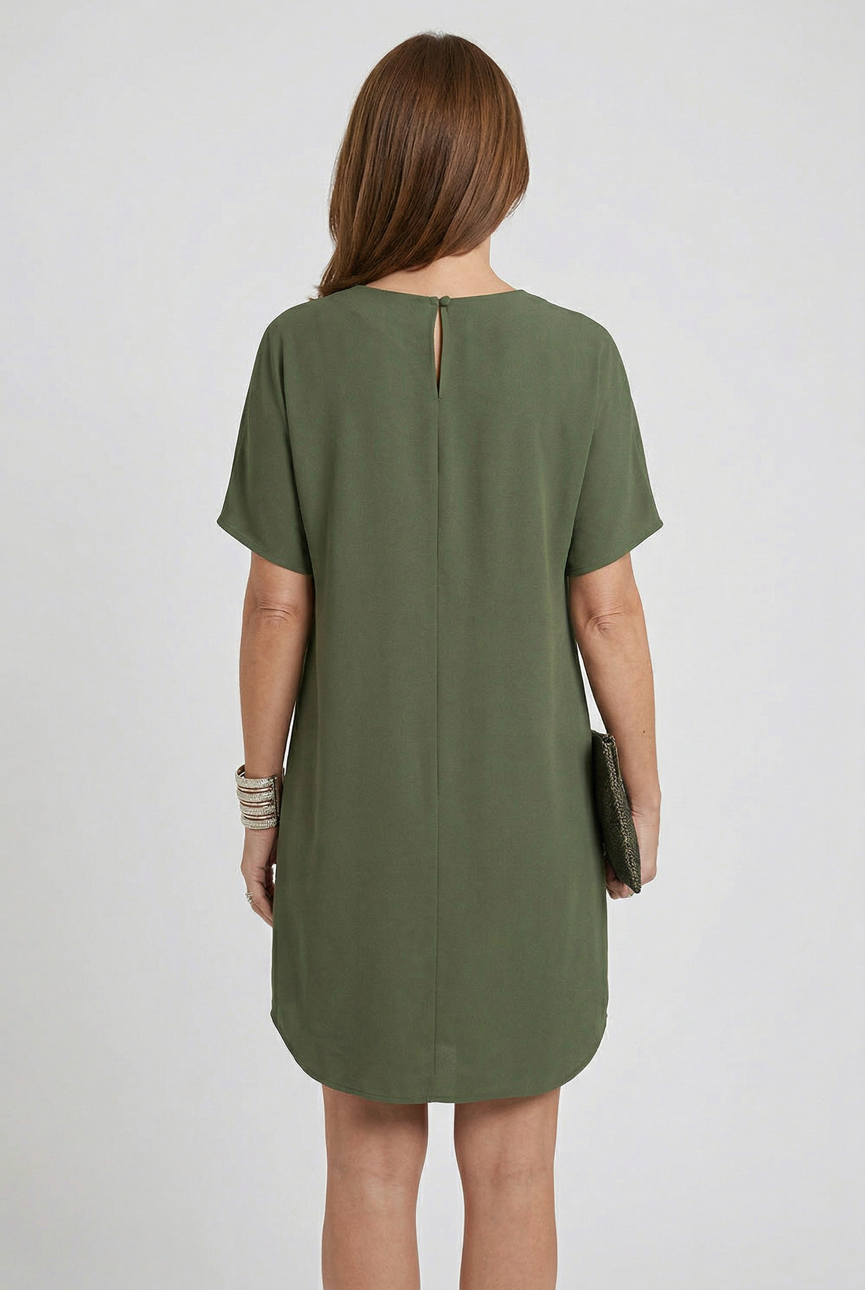 Women's V-neck summer mini dress with short split sleeves, side profile view