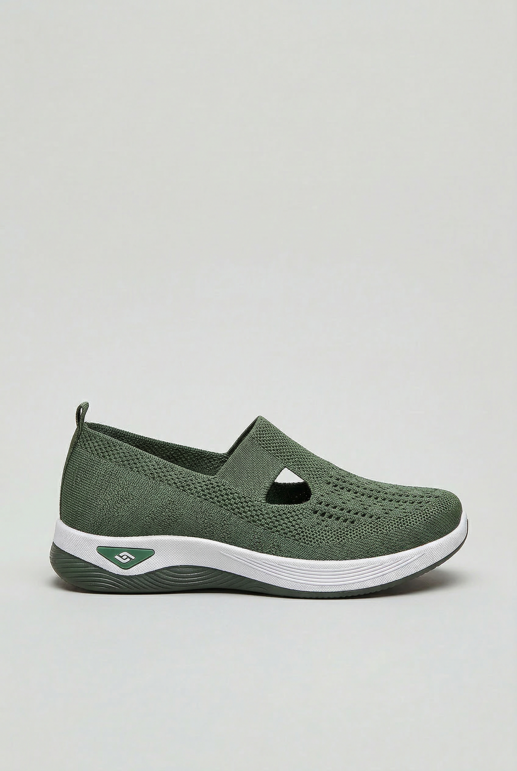 Women's slip-on trainers with orthopaedic arch support, side view
