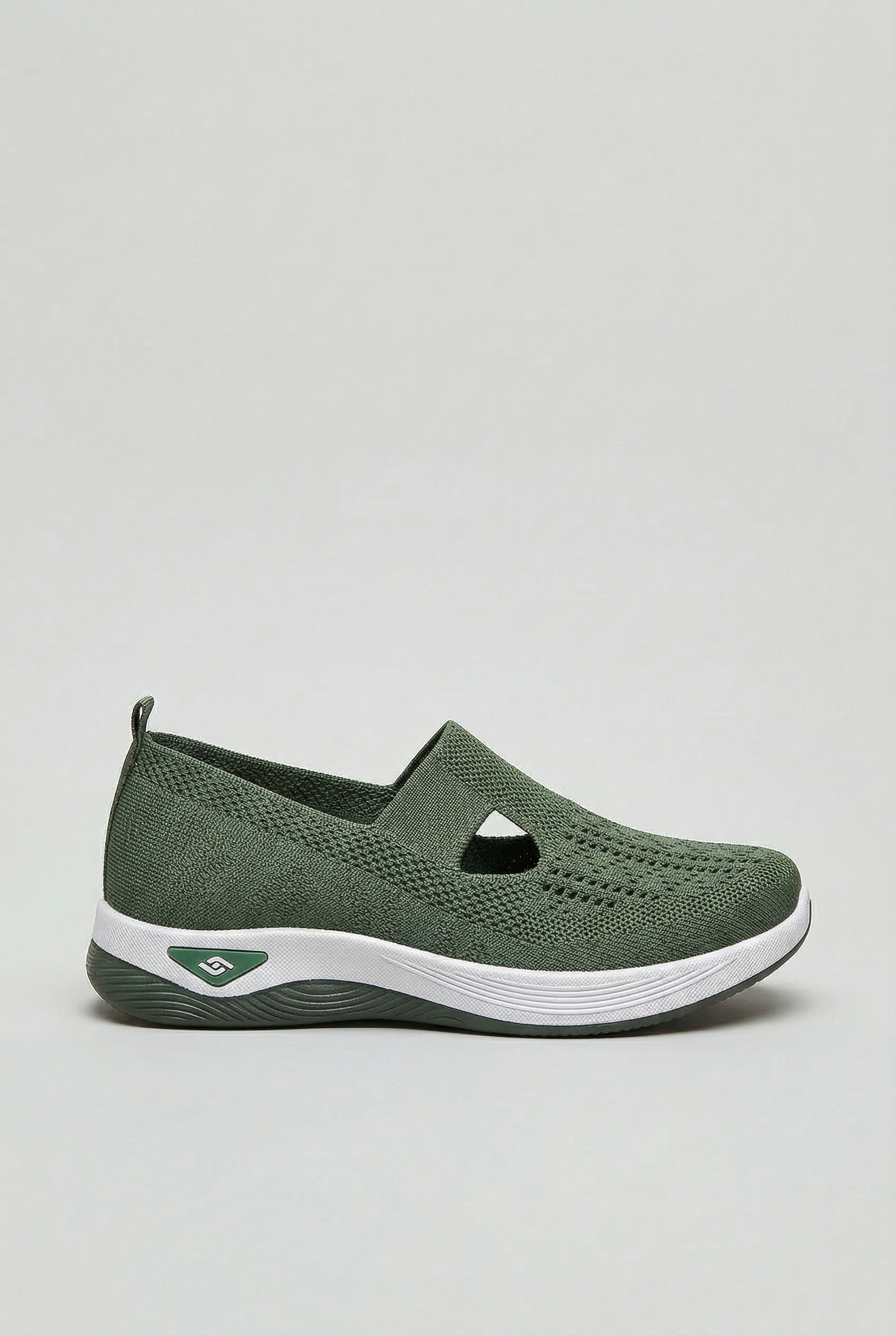 Women's slip-on trainers with orthopaedic arch support, side view