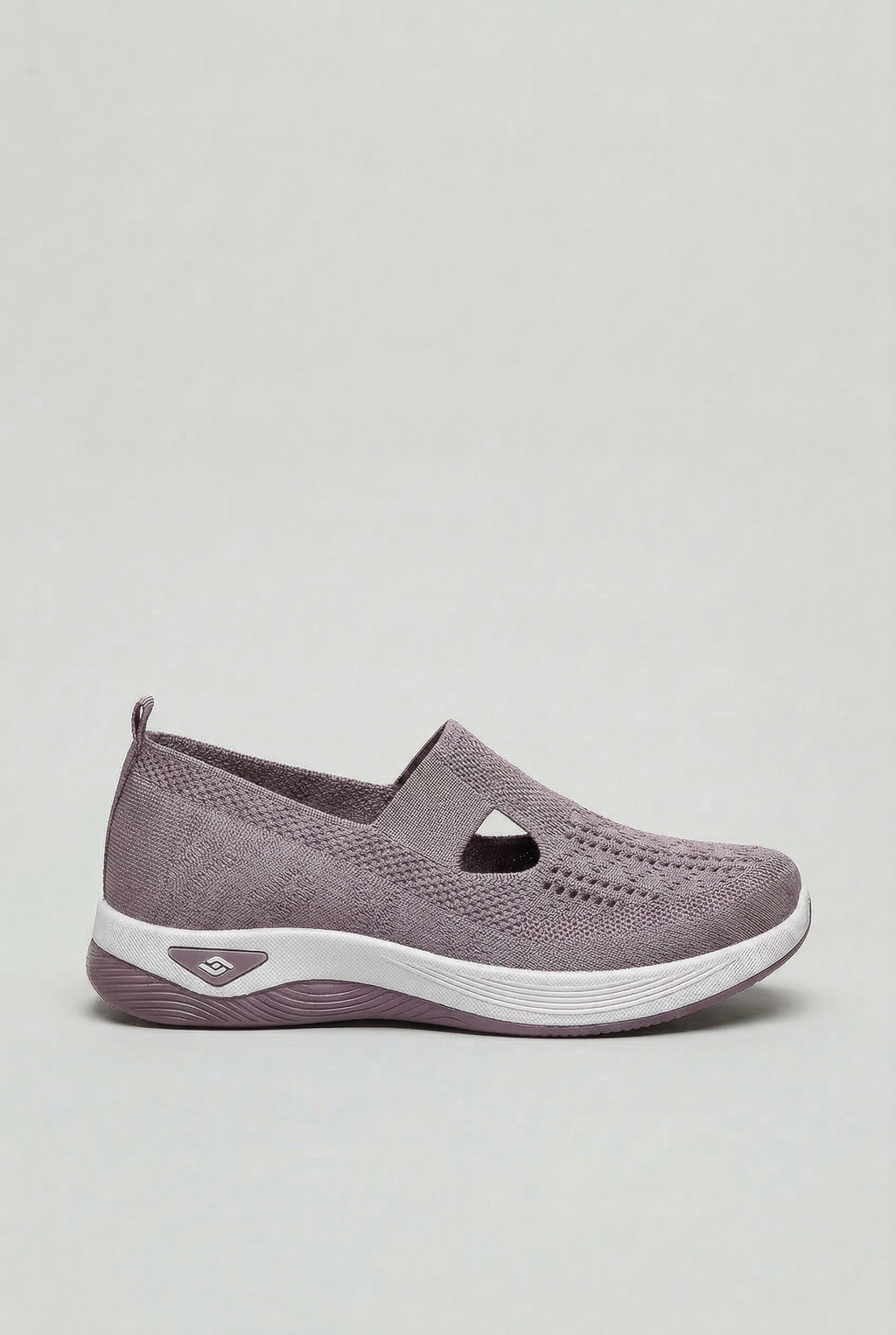 Women's slip-on trainers in alternate colour, side view