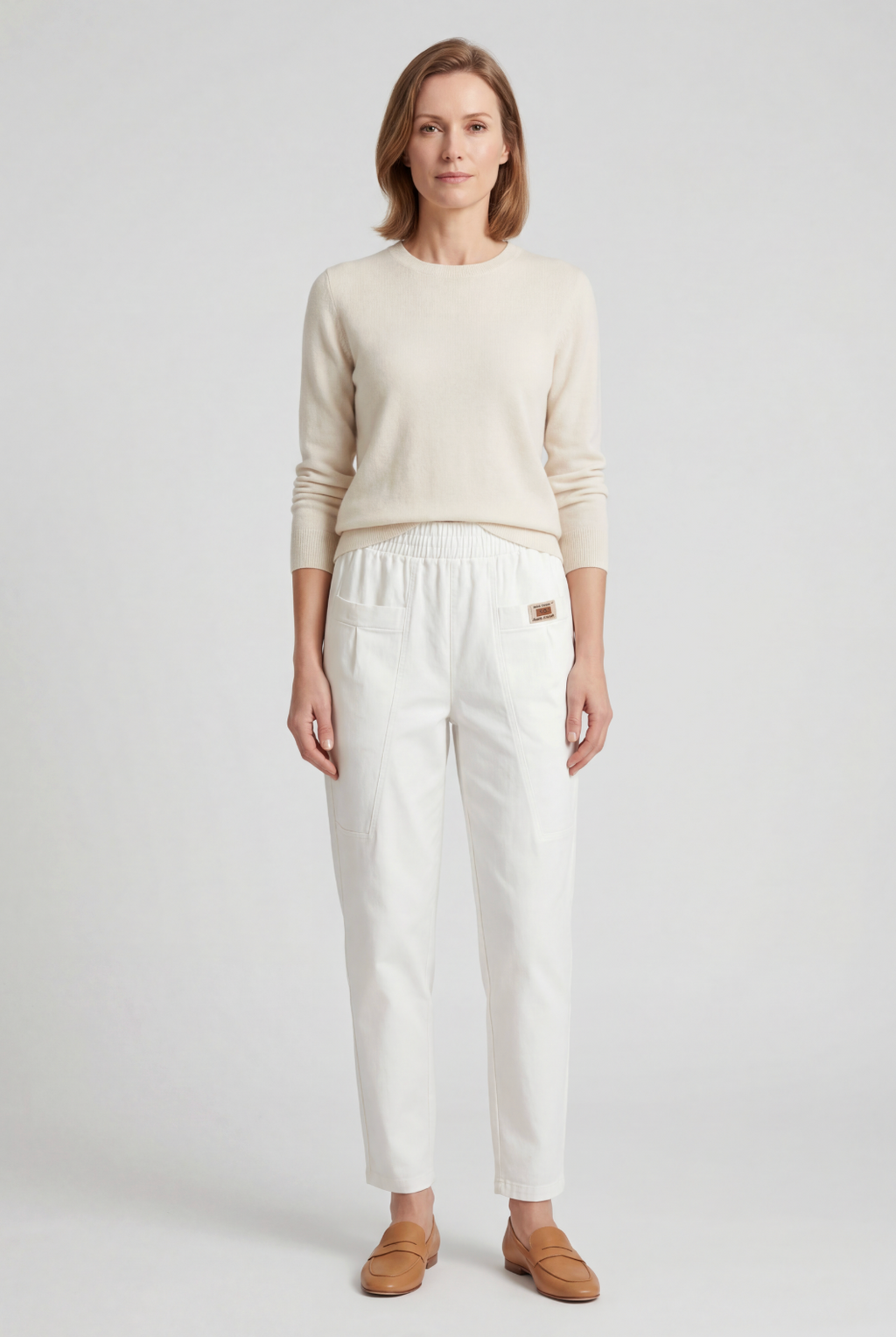 Straight-leg elasticated waist trousers, side view