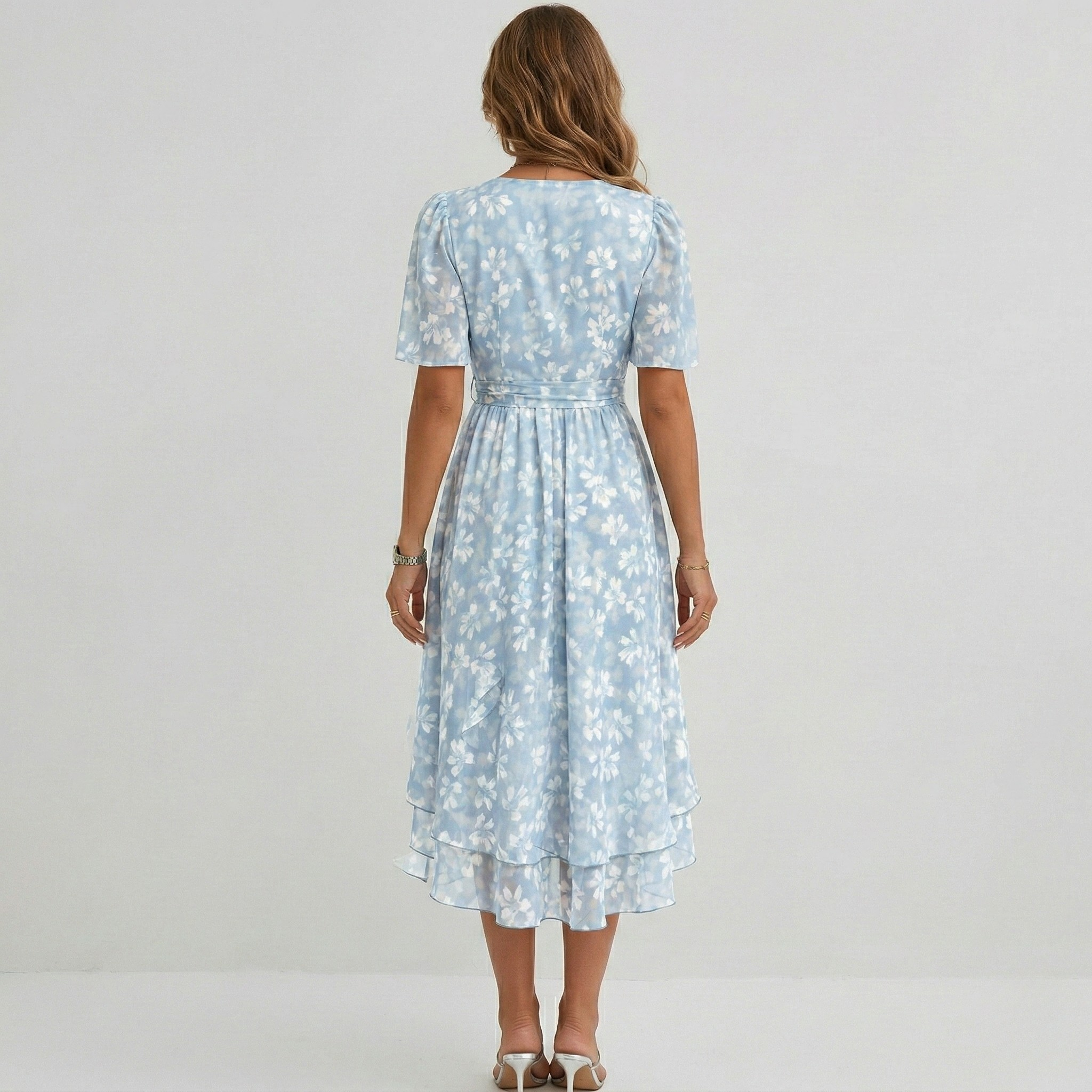 Wrap midi dress with flutter sleeves and tiered hem, side view