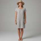 Casual linen mini dress with pockets styled with sandals, lifestyle shot