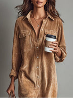 Women's chic flared hem dress detail showing flared silhouette