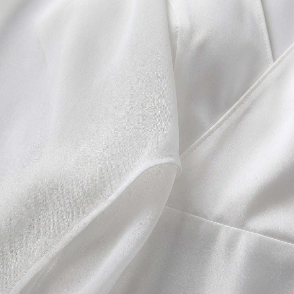 Women's classic wedding dress with long sleeves, styled front view