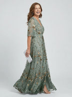 Women's floral embroidered maxi dress in sage green, embroidery detail close-up