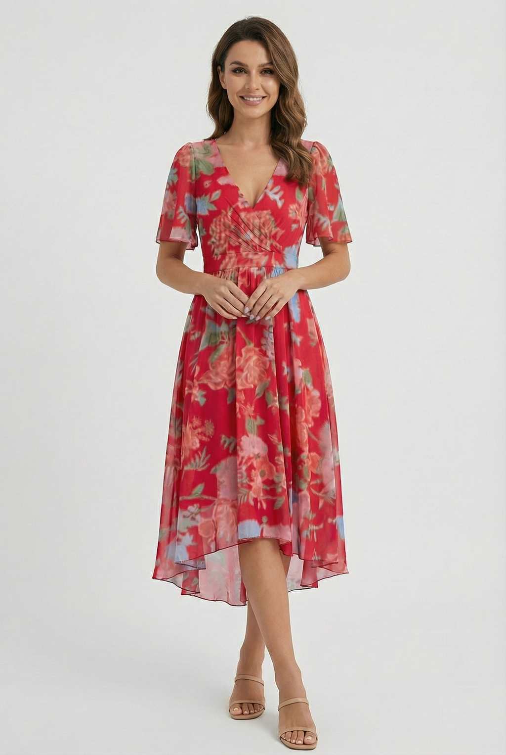 Women's flowing floral dress, fabric drape close-up