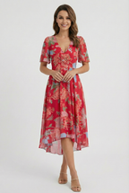 Women's flowing floral dress, fabric drape close-up
