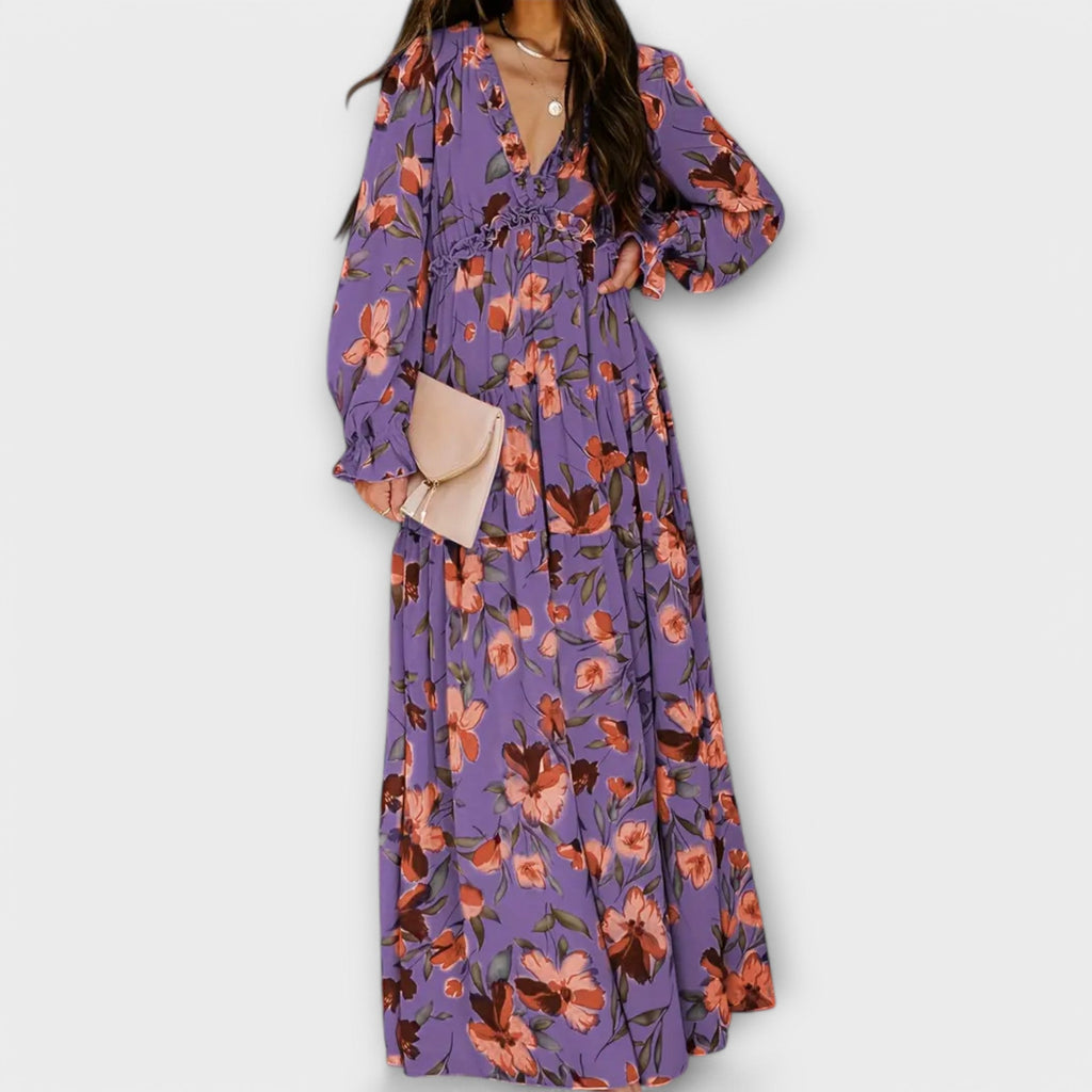 Vibrant floral print pleated maxi dress styled for garden party