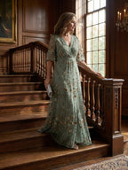 Women's boho floral holiday maxi dress in sage green, lifestyle shot