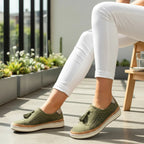 Perforated vegan leather slip-on flat shoes in green – top view