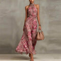 Green floral wedding guest maxi dress with open shoulder, lifestyle shot