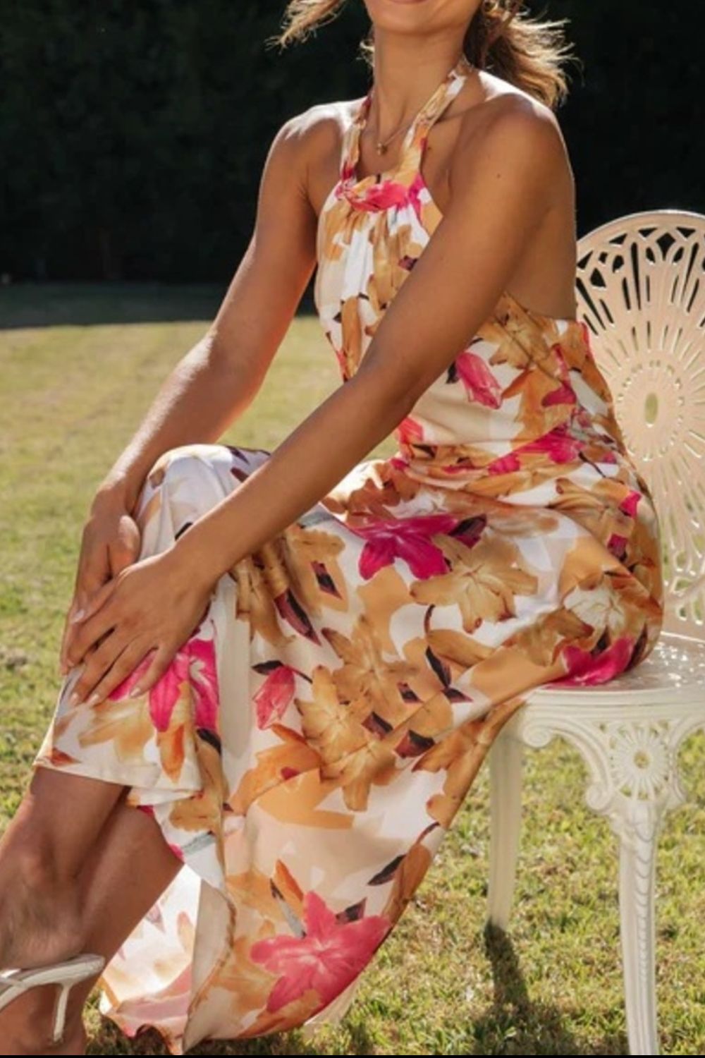 Women's floral print halter neck maxi dress with slit, back view