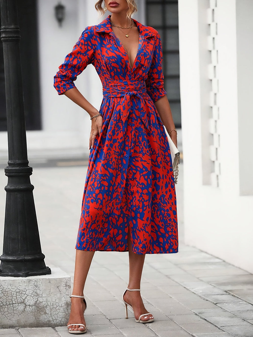 Women's elegant geometric print shirt dress styled for summer evening