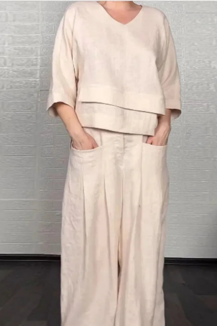Minimalist two-piece co-ord set in light blue, V-neck top and wide-leg trousers | Alba Muse