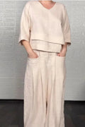 Minimalist two-piece co-ord set in light blue, V-neck top and wide-leg trousers | Alba Muse