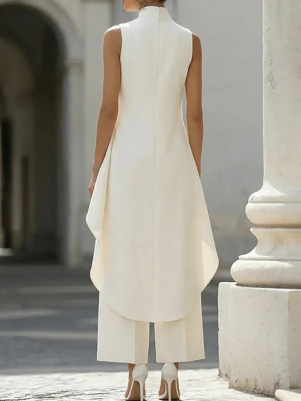 Sleeveless high neck layered tunic co-ord set in cream white, full length view