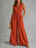 Orange sleeveless stand collar jumpsuit, front view
