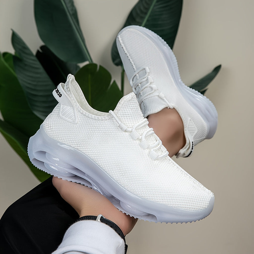 White knit trainers with translucent sole, close-up hand-held view
