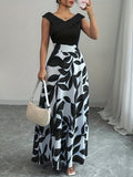 Wedding guest A-line maxi dress in black, back view