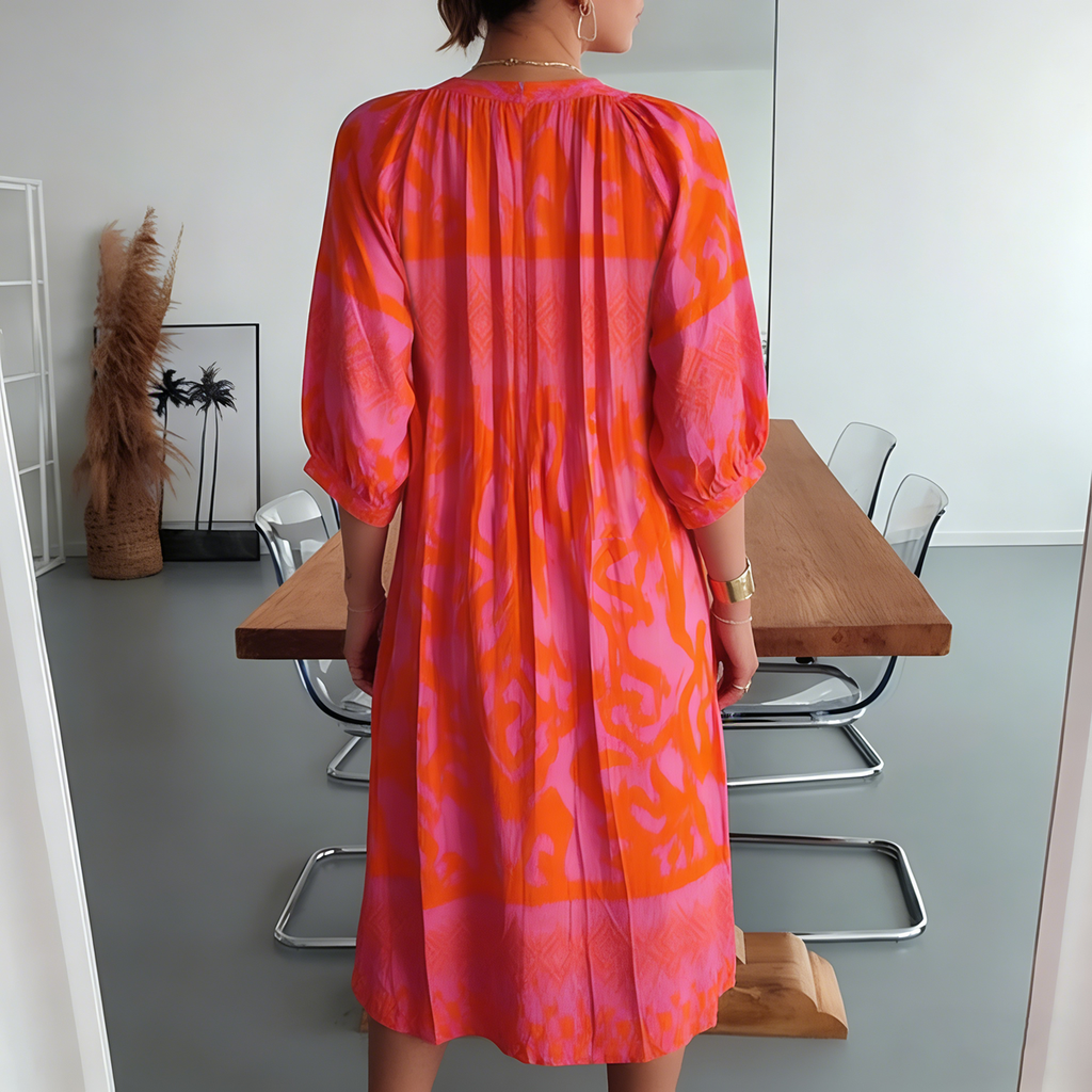 Hot pink print shirred midi dress styled for garden party occasion