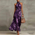 Elegant floral halter maxi dress styled for garden party occasion