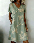 Diagonal button print V-neck short sleeve midi dress in green, front view