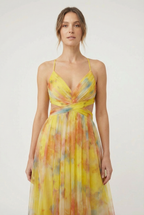 Women's chiffon floral maxi dress, back view showing adjustable closure