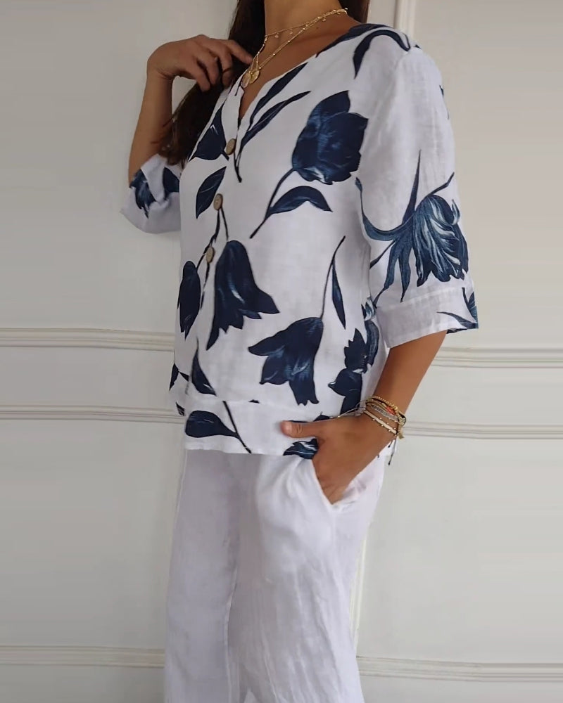 Three quarter sleeve floral print blouse, side view