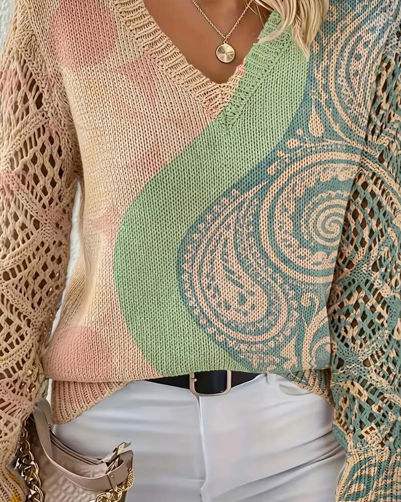 Hollow-out V-neck knit pullover, side view