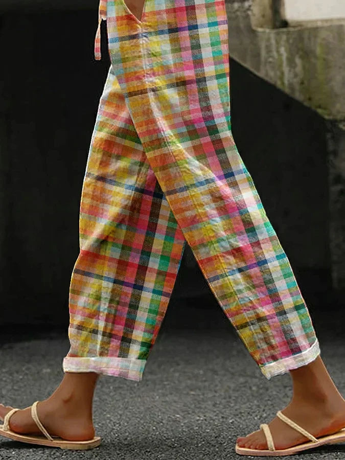 Cropped check trousers with rolled cuff, side view