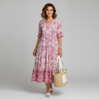 Women's floral midi dress in pink – V-neck 3/4 sleeve tiered silhouette