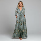 Sage green floral maxi dress with V-neckline and short sleeves