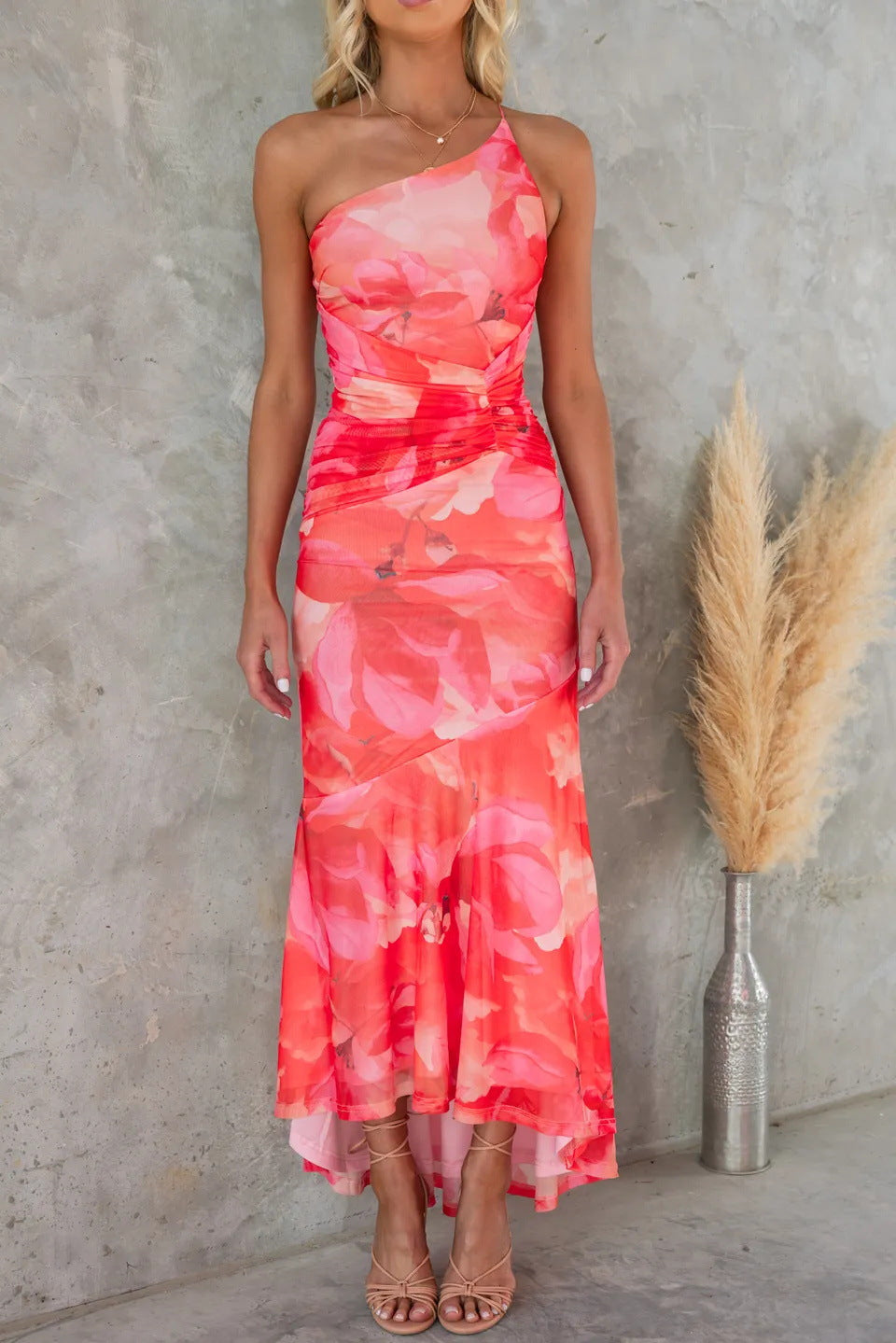 Women's asymmetric one-shoulder maxi dress with pleated skirt, side view