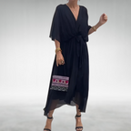 Wedding guest chiffon maxi dress with V-neckline and tie waist, side view