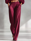 Rose Red tailored woven satin trousers, front view