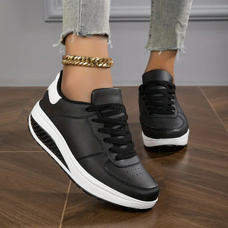 Black platform lace-up trainers, front view