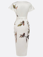 Women's wrap maxi dress in lush leaf print showing full-length silhouette