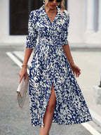 Women's geometric print shirt dress showing silky fabric drape, three-quarter view