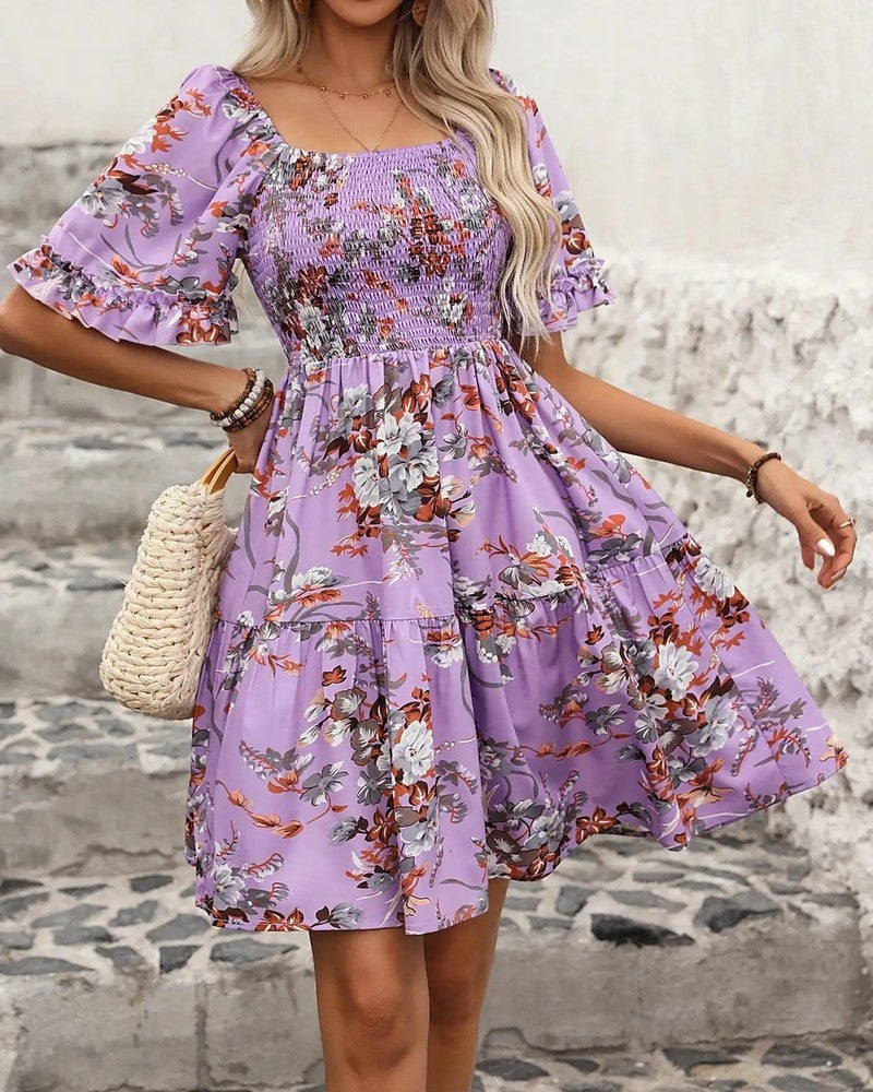 Floral smocked puff sleeve mini dress in purple, front view