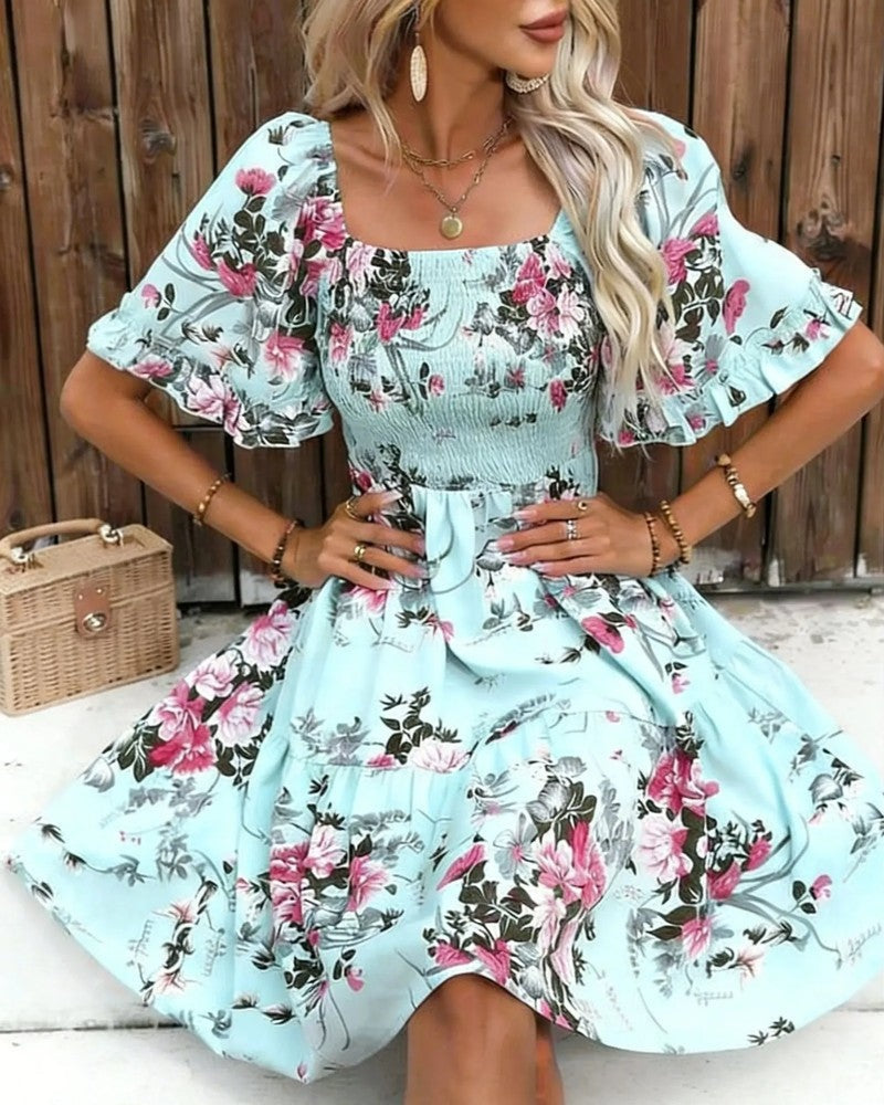 Floral smocked mini dress in navy, outdoor styled