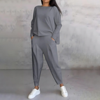 Front view of women's loose-fit co-ord set flowy top and tapered pants