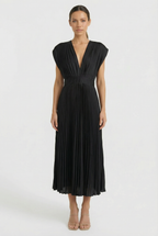 Women's pleated formal maxi dress, styled for an elegant occasion