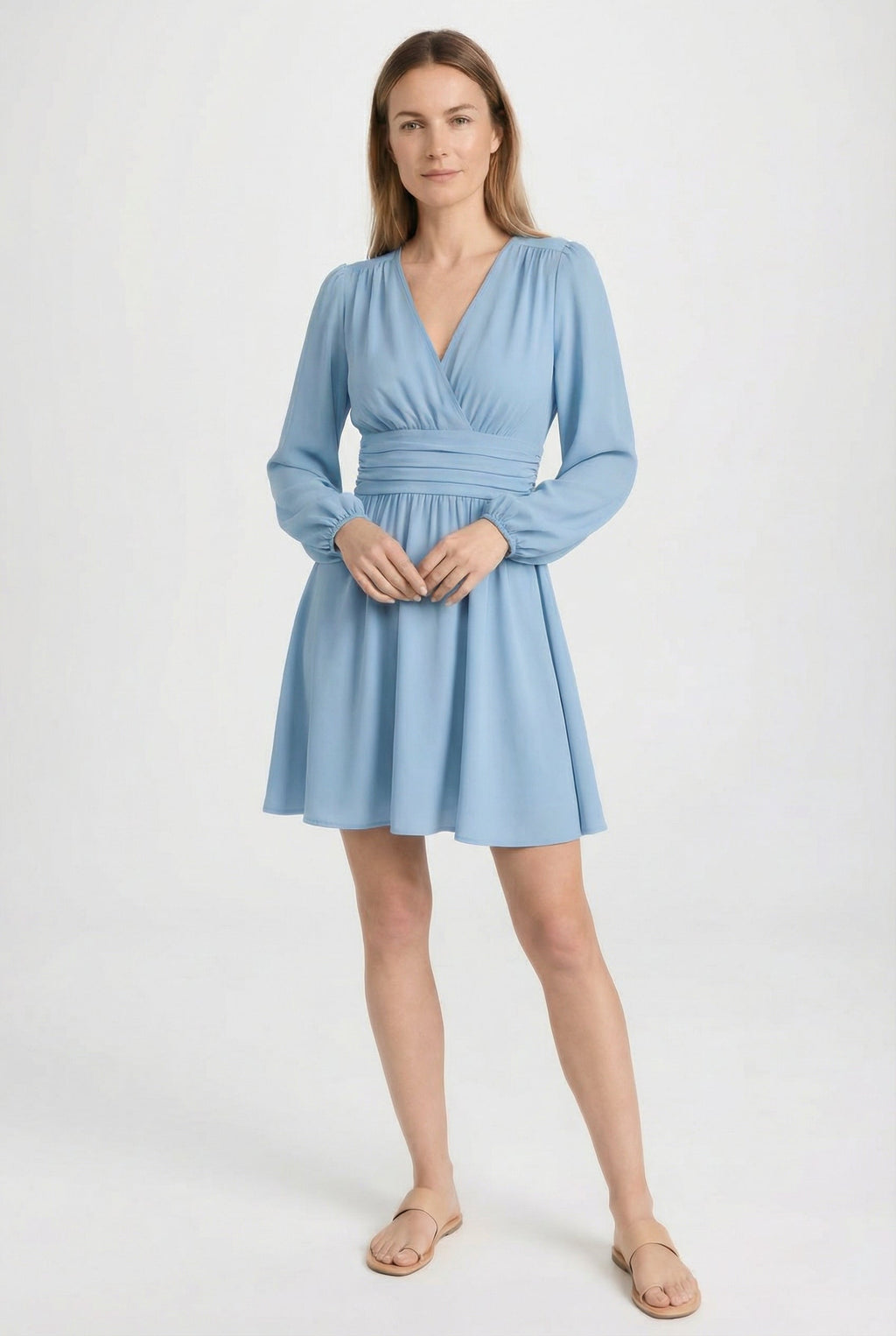 Women's lightweight pleated midi dress styled for an evening occasion