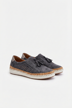 Women's perforated vegan shoes, close-up of upper texture