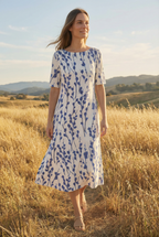 Women's loose fit floral midi dress in blue – outdoor lifestyle relaxed view