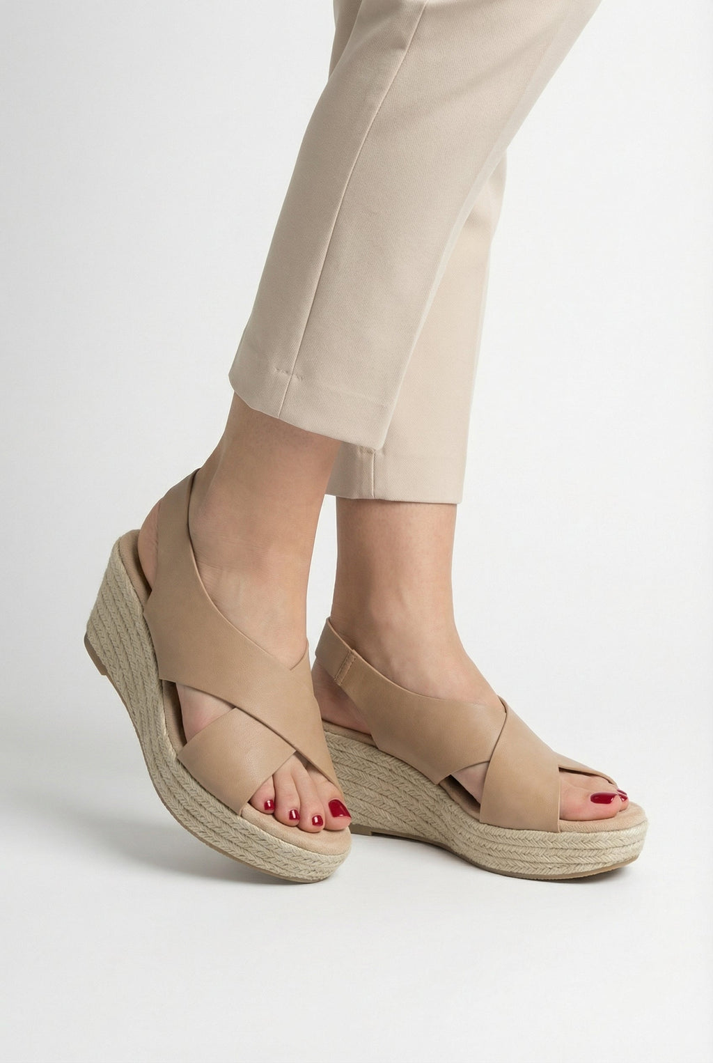 Women's open toe sandals styled with casual outfit, full length