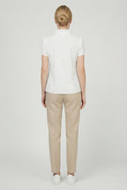 Women's relaxed fit blouse styled with trousers, full length