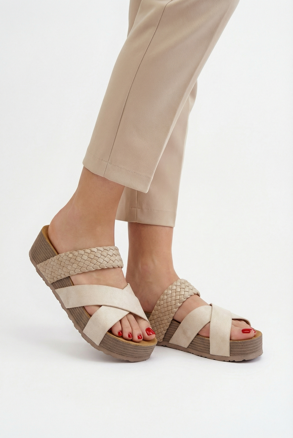 Women's casual summer sandals styled with a dress, full length