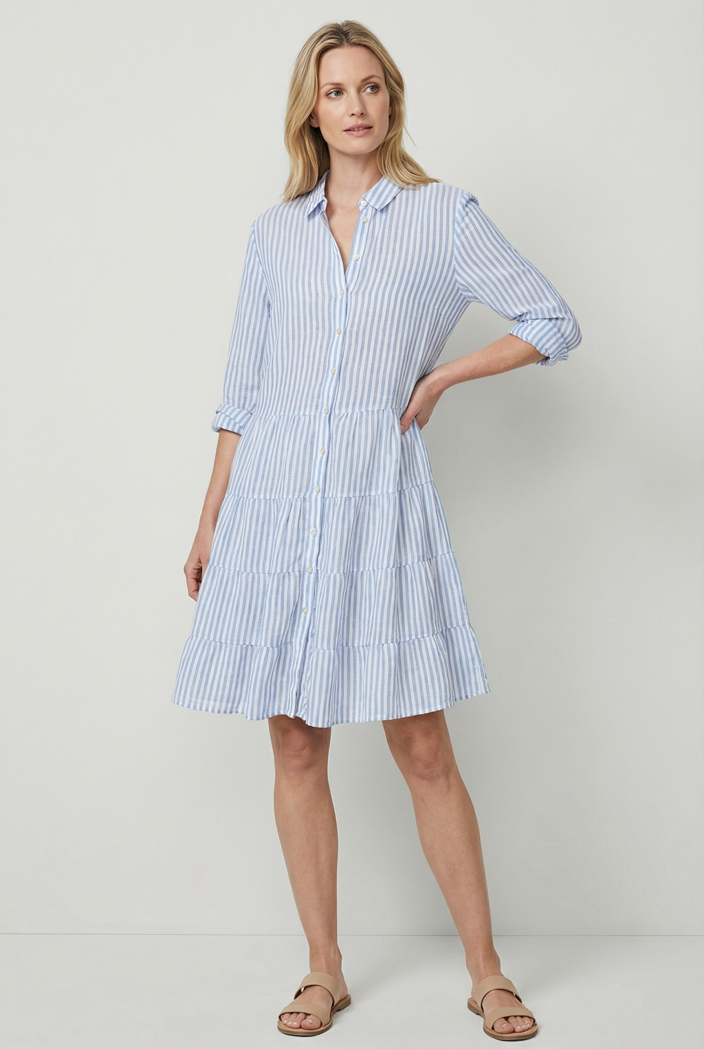 Women's striped mini dress with A-line silhouette, side view